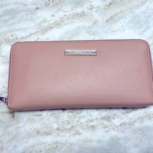 Vince Camuto soft pink pebble leather wallet. One external pocket.